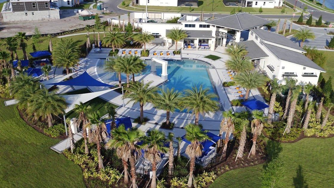Photo of an aerial view of the community pool and clubhouse