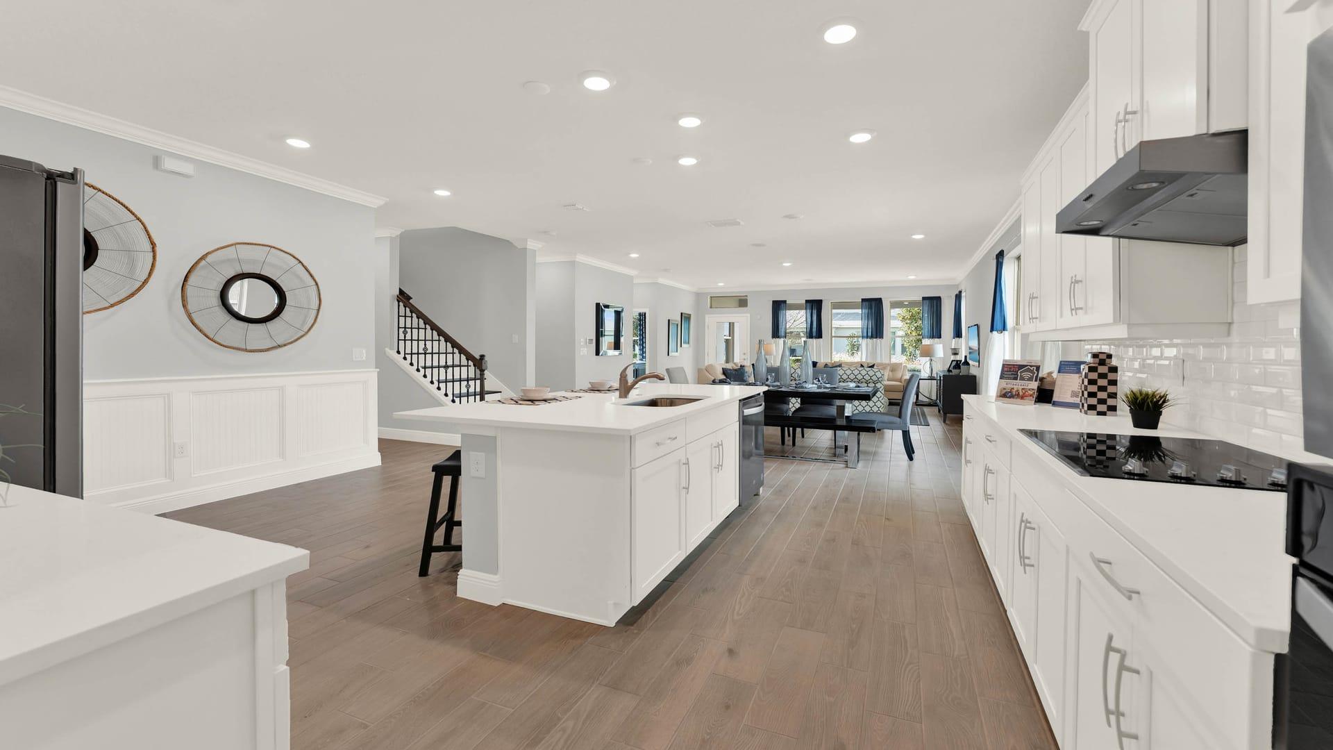 Model home kitchen open to the living area